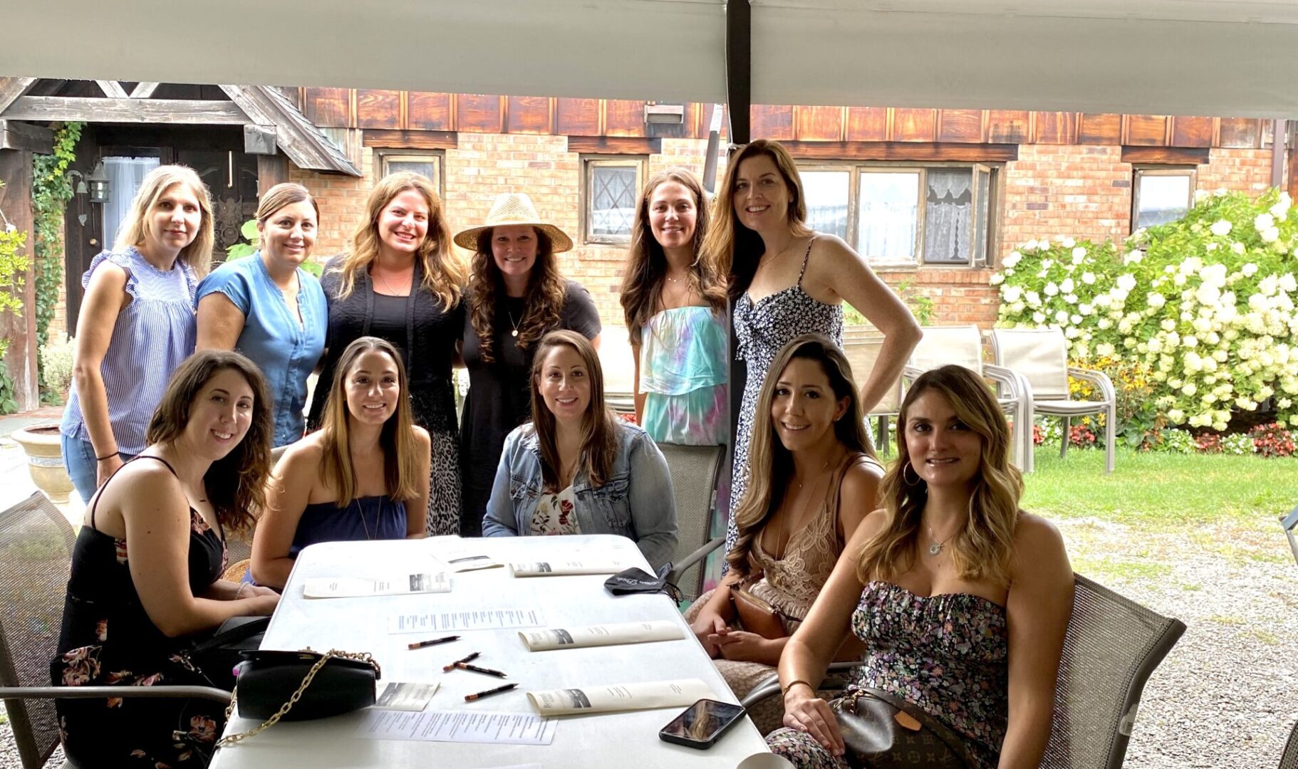 A group of women sitting at a table.